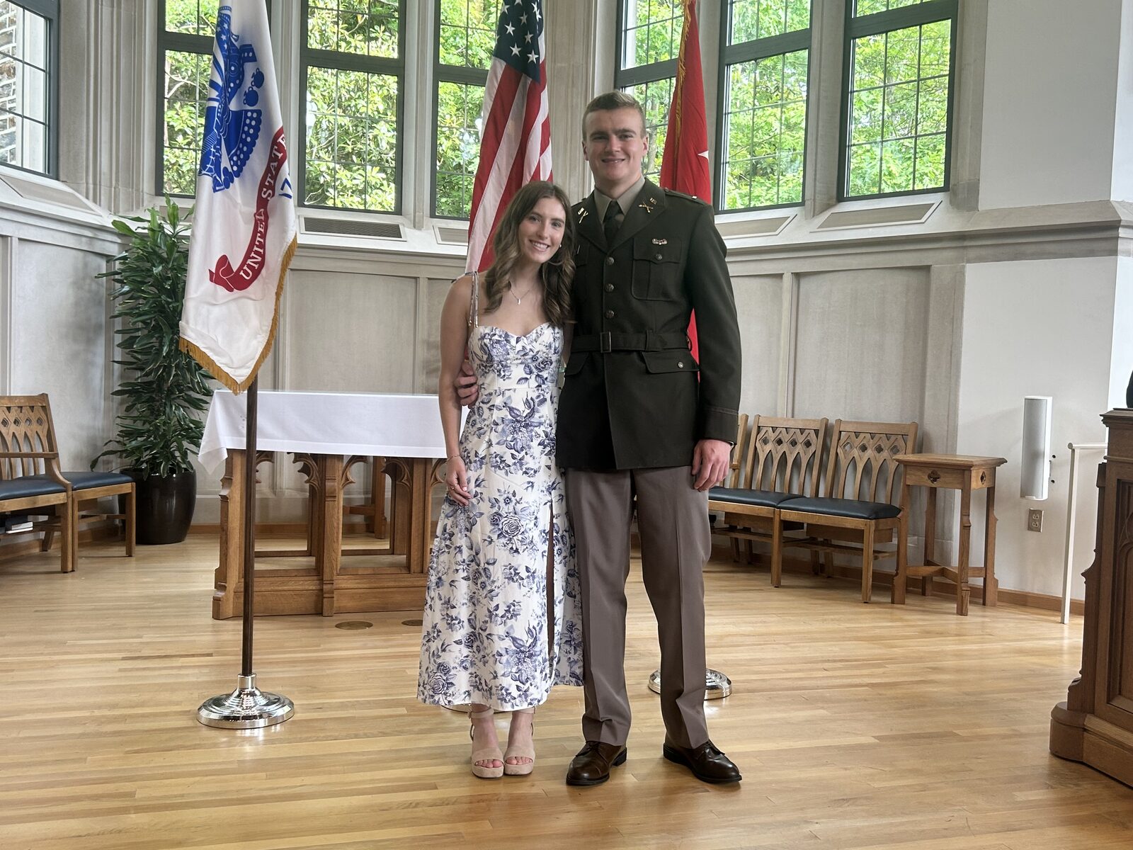 Sydney and her service member at his commissioning ceremony
